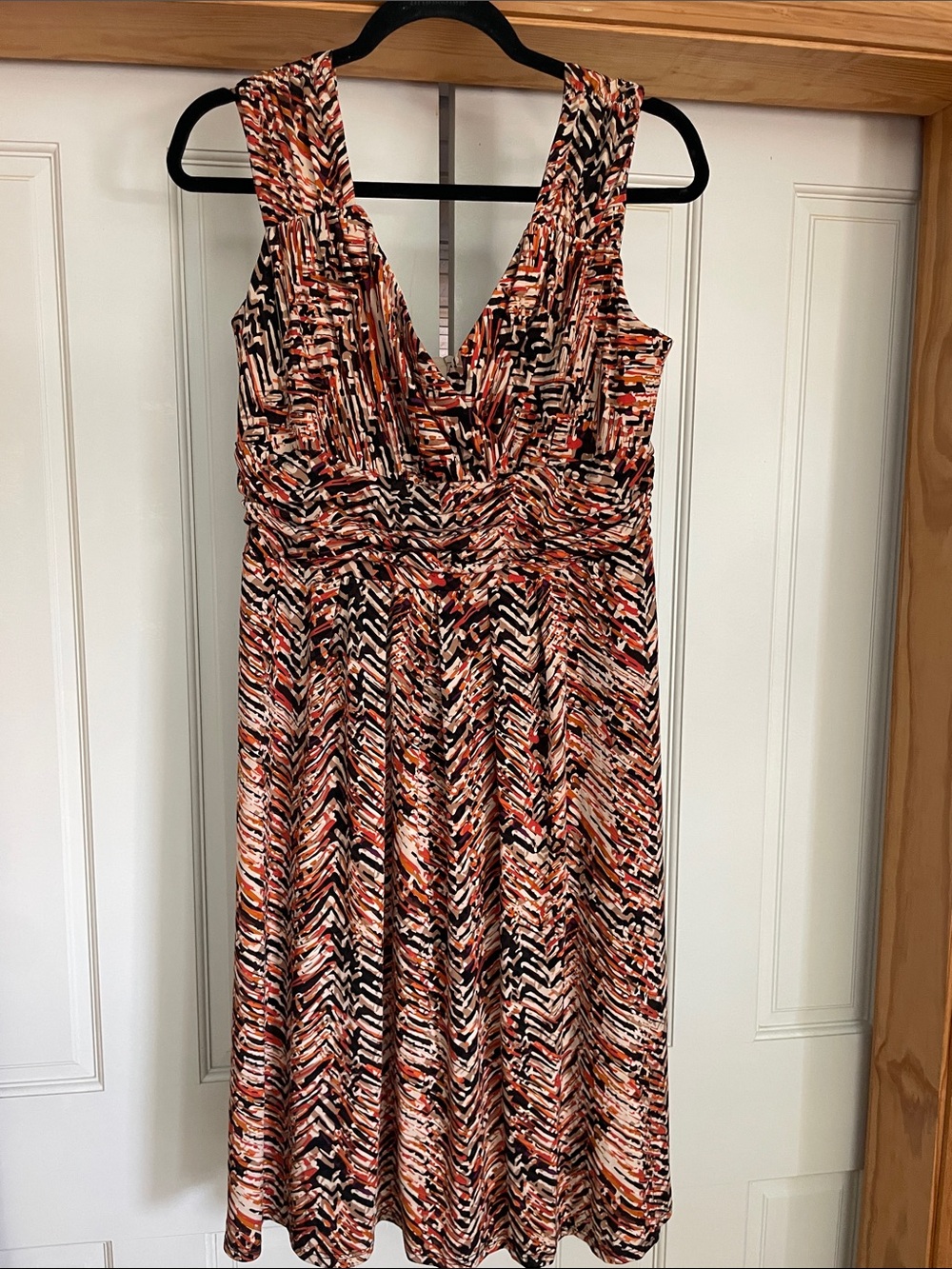 TravelSmith V-Neck Midi Dress in Orange, Black and Cream Print